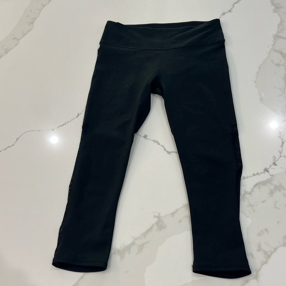 Fabletics black leggings with mesh on back on legs